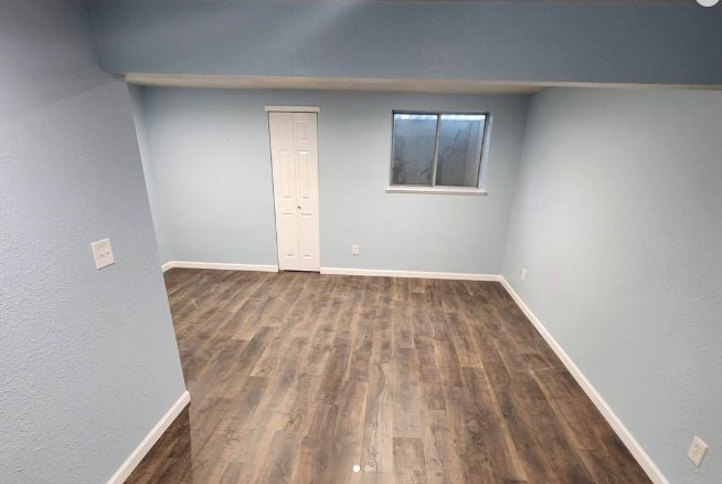 After: finished room with new floor and paint